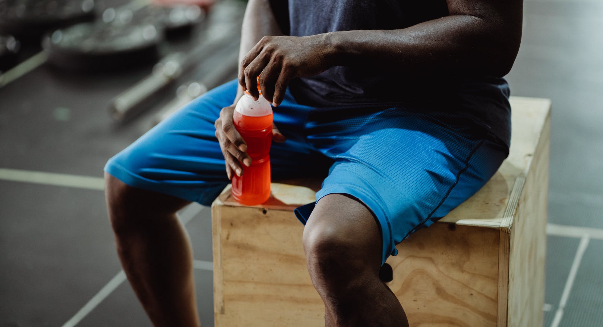 Athlete drinking supplements