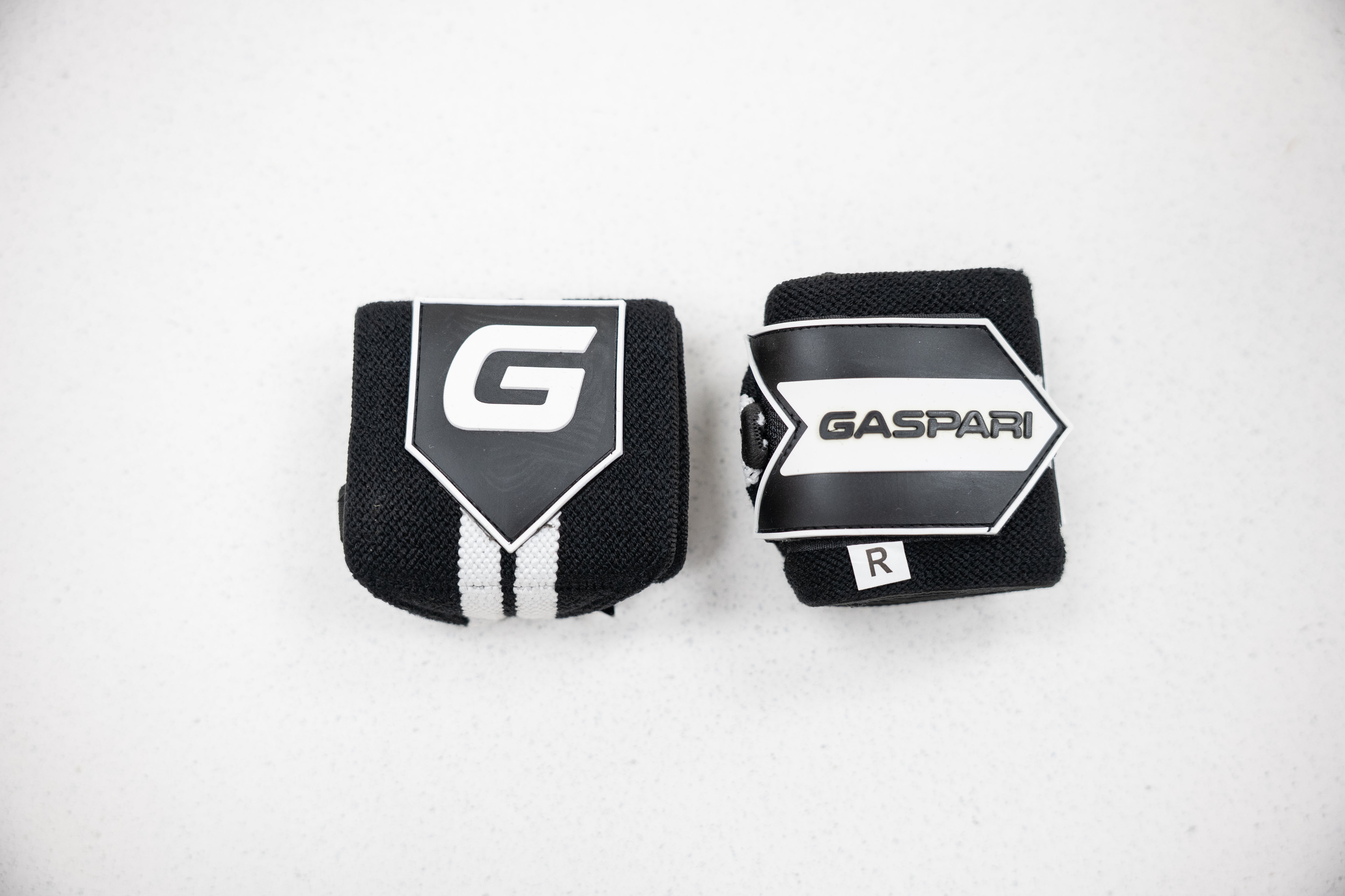 Gaspari Wrist Wraps showing a combination of black and white branding for optimal wrist safety.