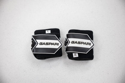 Gaspari Wrist Wraps labeled L and R for precise fit, offering support during heavy lifting.