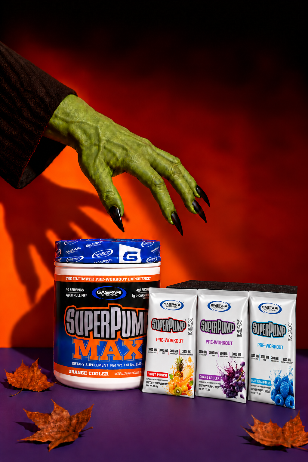 A green monster hand reaching for SuperPump Max Orange Cooler and three sample packs